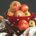 Fresh Apples In Red Polka Dot Bowl With Striped Cloth Nuts And Knife