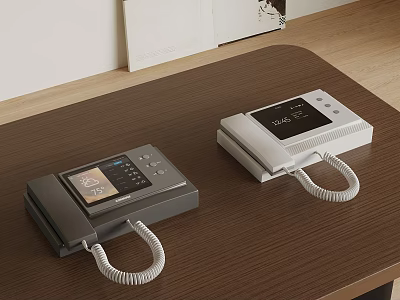 Two Gray And White Telephone Landlines On Wooden Tabletop With Display Screens And Curly Handset Cords 3d model