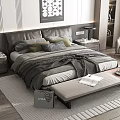 Double Bed With Leather Headboard Pillows And Blanket In Modern Bedroom With Nightstands And Wall Art