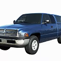 Blue Dodge Classic Four Door Pickup Truck With Off Road Tires And Grille Front