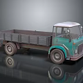 Vintage Teal Truck With Open Metal Cargo Bed And White Roof