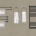 Soft Striped Gray White Towels Hanging On Black Towel Racks And Rings Against Beige Wall