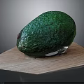 Ripe Fresh Green Avocado With Rough Texture On Wooden Cutting Board