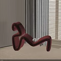 Modern Red Curved Lounge Chair In Upholstered Design For Indoor Living Space