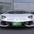 White Sports Car with Sleek Aerodynamic Design Black Roof and Sporty Wheels