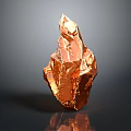Natural Copper Ore Crystal With Metallic Luster Surface Against Dark Background And Base Reflection