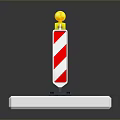 Red And White Striped Marker Pole With Yellow Top On White Base And Black Bottom