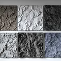 Textured Background Wall With Various Stone Like Textures And Gray White Black Blue Tones