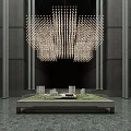 Commercial Equipment Including Elongated Pendant Chandelier and Architectural Model Display Stand in Dark Interior