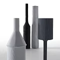 Ceramic Vessels with Various Shapes Black White Grey Colors and Textured Surfaces