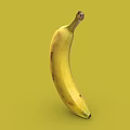 Isolated Fresh Ripe Yellow Banana With Brown Spots On Green Background