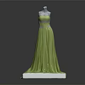 Elegant Green Strapless Long Dress With Decorated Waist And Flowy Skirt On Mannequin