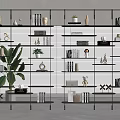 Modern Open Metal Shelf Unit With Books Decorative Items And Green Plant Against Window Blinds