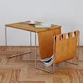 Wooden Top Coffee Table With Metal Frame Orange Chairs And Magazines On Herringbone Floor