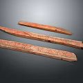 Three Long Stone Wood Carved Decorative Strips Featuring Detailed Patterns