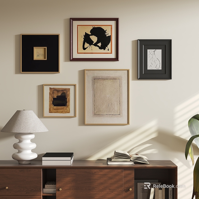 Abstract Paintings Framed on Wall with Wooden Table Lamp Books and Plant 3d model 