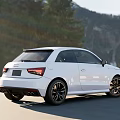 White Audi Car Parked On Road With Scenic Mountain Background Outdoor View