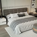 Modern Double Bed with Gray Upholstered Headboard White Gray Bedding Nightstands and Decorative Paintings
