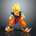 Game Movie Character With Golden Spiky Hair Orange Pants Blue Top Battle Stance Energy Aura