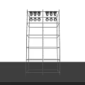 Multi tiered Metal Shelving Unit Featuring Round Objects On Top