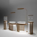 Elegant Jewelry Store Interior With Glass Display Cases Brass Lamps And Circular Rattan Counters