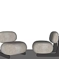 Modern Single Seater Sofa With Beige Fabric And Black Curved Frame Design