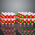 Molecular Structure Model with Red Green White Spheres Arranged in Stacked Layers