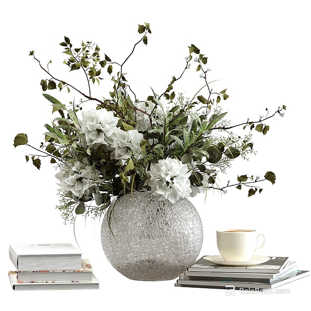 Silver Textured Vase With White Flowers Green Foliage On Table With Books And White Cup 3d model 