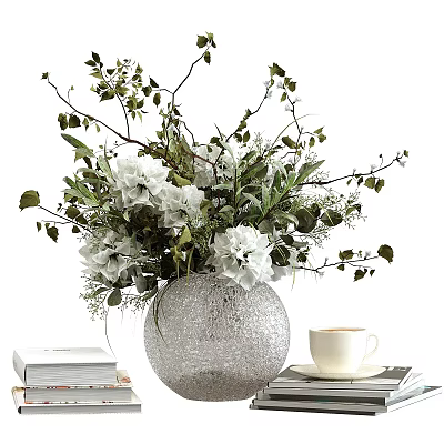 Silver Textured Vase With White Flowers Green Foliage On Table With Books And White Cup 3d model