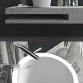 Contemporary White Ceramic Vessel Sink with Chrome Faucet Glass Vases and Soap on Gray Countertop