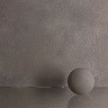 Textured Gray Component Sphere Placed On Smooth Surface With Background Wall