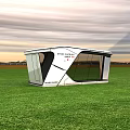 Modern Guesthouse Building With White Exterior Large Glass Windows And Green Grass Field