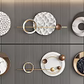 Modern Circular Wall Decor Pieces With Textured Designs And Geometric Elements On Gray Wall 3d model