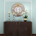 Stylish Dark Console Cabinet with Decorative Mirror White Orchids Gold Vase on Light Blue Wall