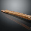 Artisan Crafted Wood And Stone Decorative Carving With Intricate Surface Patterns