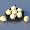 Several Fresh Yellow Pears Arranged On Black Plate With Some Outside On Gray Surface