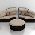 Rattan Round Sofa Design With Beige Cushions And Matching Ottoman Set