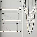 Modern Chandeliers With Linear And Circular Metallic Designs And Warm White Illumination