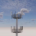 Tall Industrial Communication Tower With Antennas Under Blue Sky And Clouds