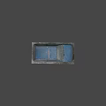 Old Blue Car With Rust And Fallen Leaves Parked On Weathered Ground