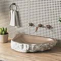 Natural Stone Washbasin on Wooden Countertop with Perforated Wall and Towel Holder