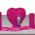 Vibrant Pink Crush Display With Heart Shape I U Plush Decorations And Person