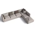 Light Gray Sectional Sofa With Multiple Cushions And Ottoman Throw Blanket 3d model