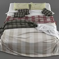 Cozy Double Bed With Plaid Blanket Yellow Pillows And Red Striped Throw
