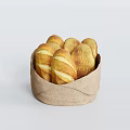 Golden Striped Bread Loaves in Paper Bag on White Background