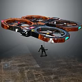 Quadruple Rotor Drone With Orange Black Frame For Rescue Transport Carrying Miniature Figure