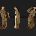 Women in traditional brown robes posing in three angles against dark background with reflective floor