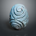 Artistic Blue Decorative Sculpture With Swirl Patterns And Textured Surface 3d model
