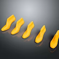 Five Yellow Shoe Toe Shapes Arranged In Row On Black Background