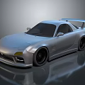 Silver Modified Sports Car With Large Rear Spoiler Black Wheels And Sleek Design